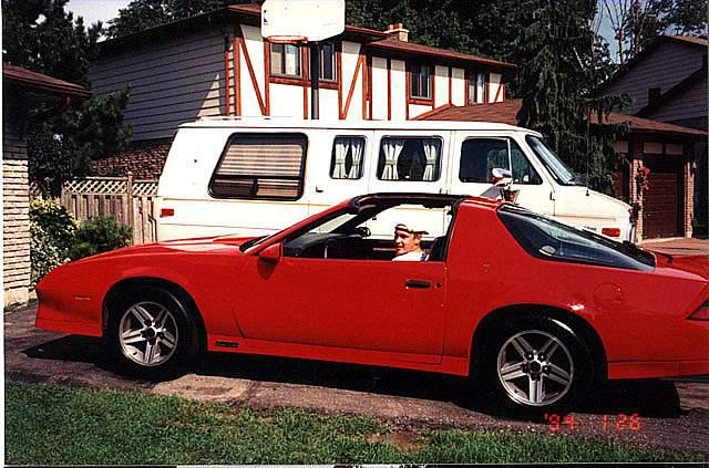 Camaro in driveway with me in it.jpg